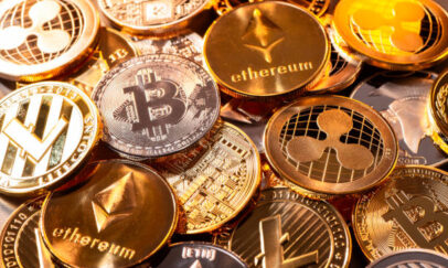 Frankfurt, Hesse, Germany - April 17, 2018: Many coins of various cryptocurrencies
