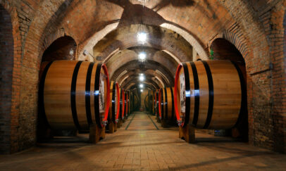 Old,Wine,Barrels,In,The,Vault,Of,Winery